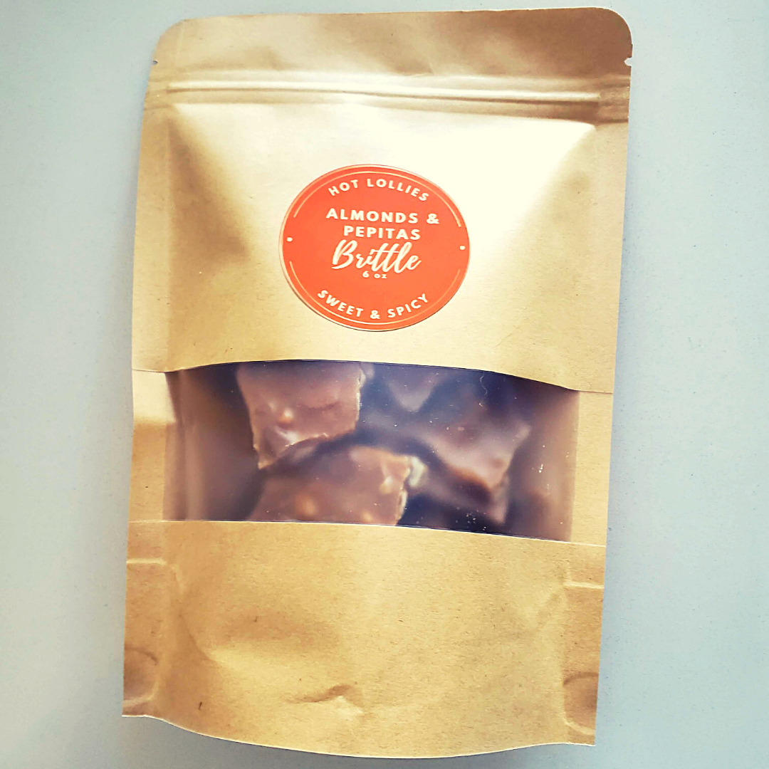 brown package of almond and pepitas brittle candy