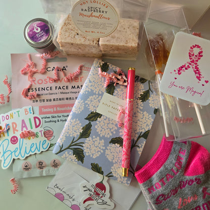 Collection of beauty and self-care products on a light surface