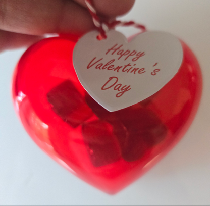 Valentine's Day candy heart filled with hot Cinnamon candy drops