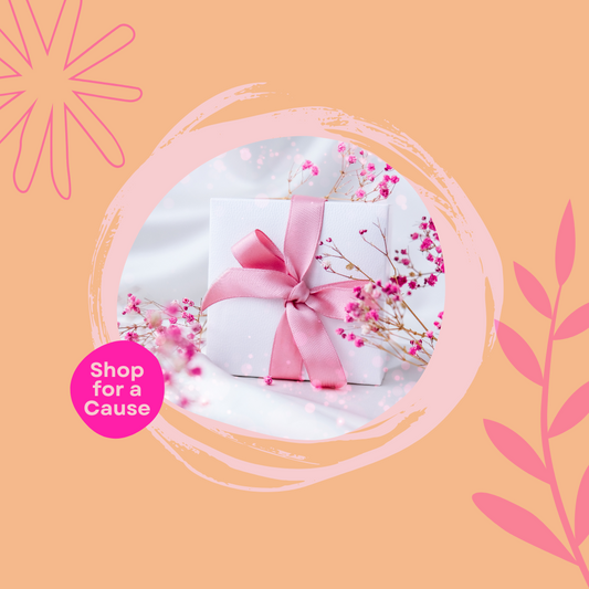 Gift box with pink ribbon on a peach background with decorative elements