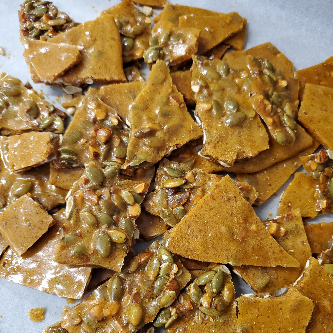 close up of almond pepitas brittle candy