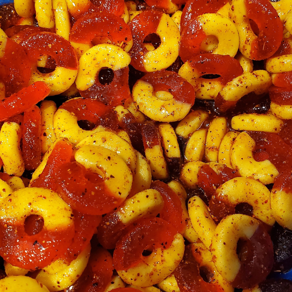 close up of chamoy peach gummy rings